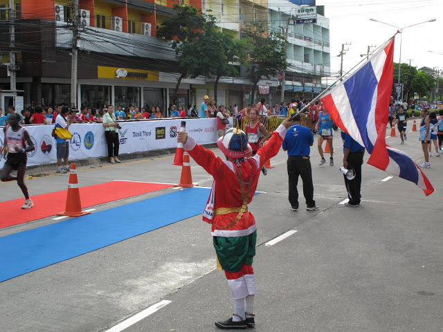 The Pattaya Marathon July 18th 2010 the Thai flag greets finishers at the Pattaya marathon