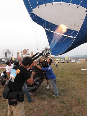 pattaya thailand hot air balloon fiesta 2011 uprighting a hot air balloon at the pattaya balloon fiesta