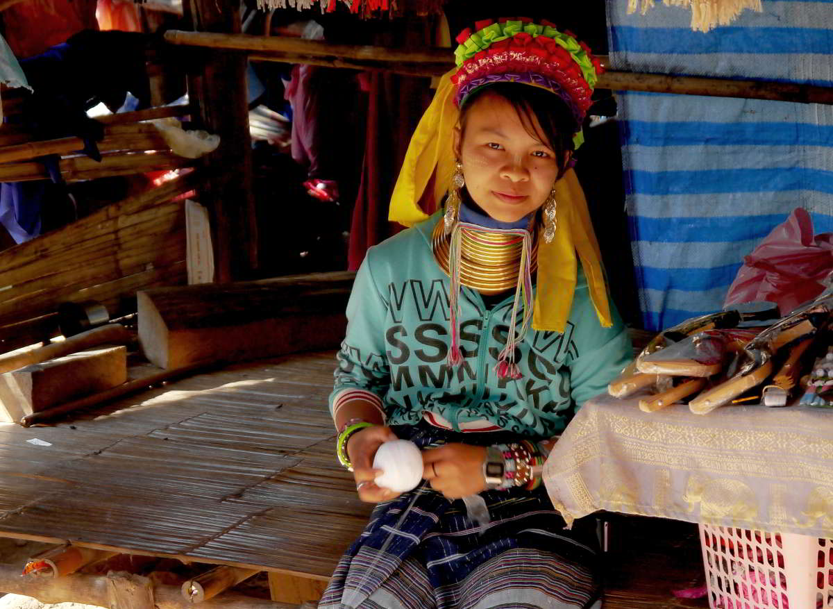 Long Neck girl working at the Long Neck Village in Chiang Mai Thailand