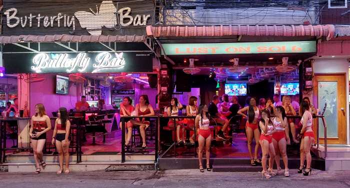 Thai bar girls stood outside bars on Soi 6, Pattaya, Thailand