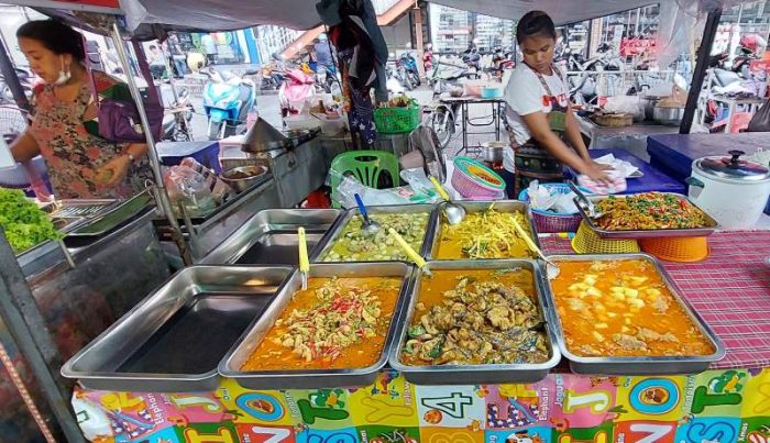Cheap Thai street food at a food market on Soi Buakhao, Pattaya, Thailand