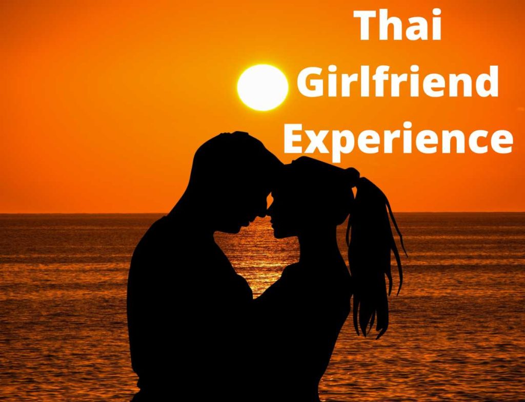 Romantic sunset beach moment with holiday girlfriend in Thailand