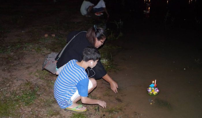 releasing a krathong during the Thai Loy Krathong festival Krathong