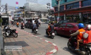 Cars and motorcycles heading along South Pattaya Road