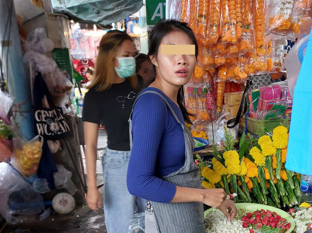 Attractive Thai woman working at a fresh market in Pattaya