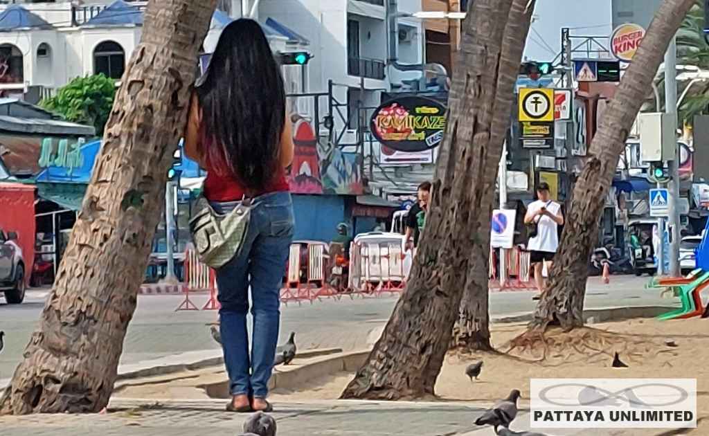 Thai freelance girl on beach road in Pattaya